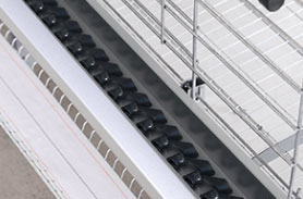 enriched chicken cage feeding